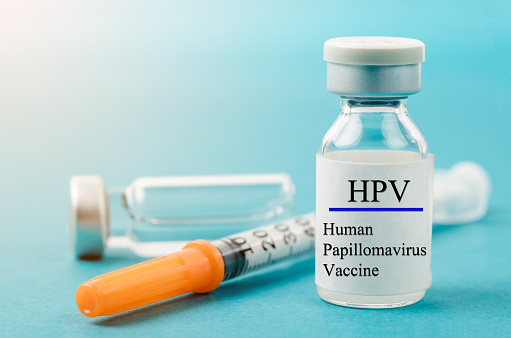 HPV Vaccine with syringe and empty vial